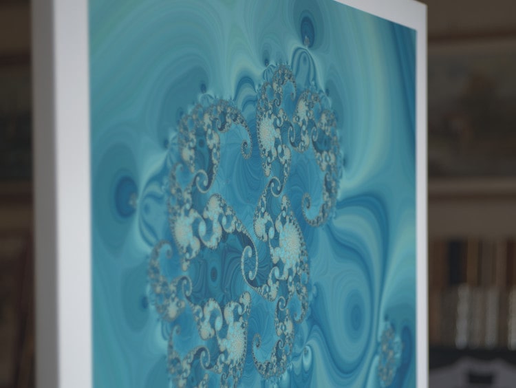 Mathematical art. A close-up of a canvas fine art print of the blue and turquoise fractal CD0, a Julia and Fatou set.